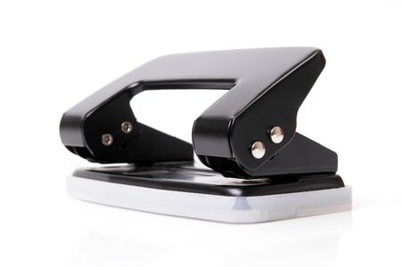 Black office puncher over white backgroundの写真素材