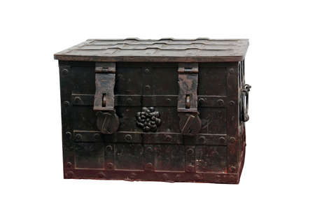 Old metal chest with ornamental iron fittings over white backgroundの写真素材