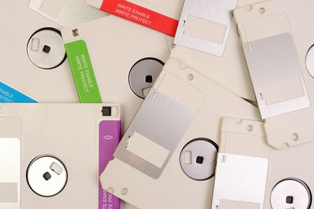 Background of floppy disk pile の写真素材