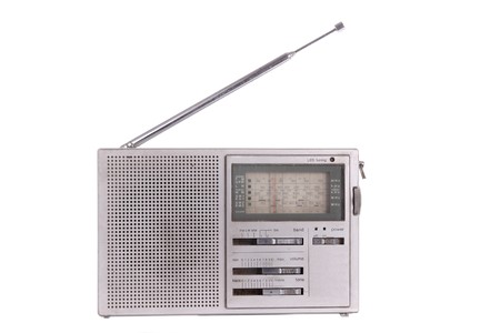 Old silver radio receiver isolated on white backgroundの写真素材
