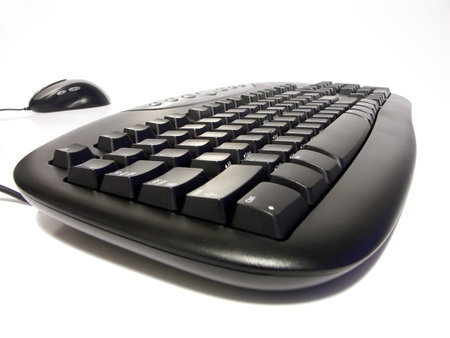 Keyboard and mouse over white background