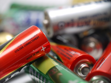 Closeup of pile of used alkaline batteriesの写真素材