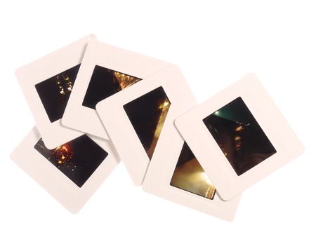 Scattered 35 mm slides with white borders shot on whiteの写真素材