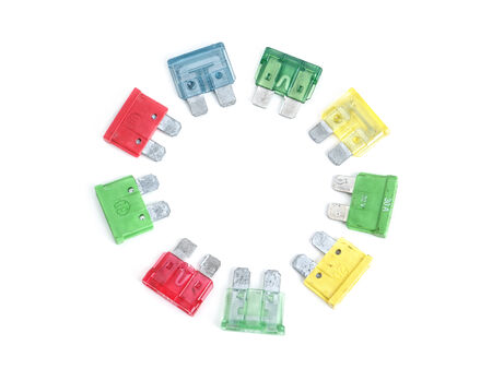 Set of car fuses arranged into a circle shot on white backgroundの写真素材