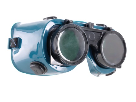 Welder's safety goggles over whiteの写真素材