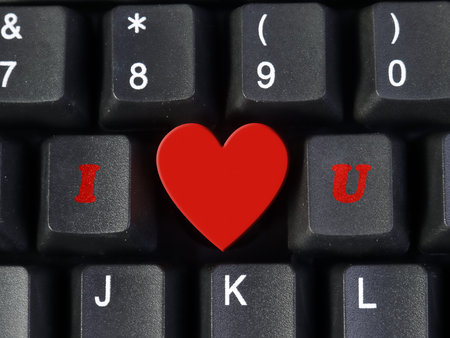 I Love You acronym arranged from computer keyboard keys I and U with heart shape representing Love...