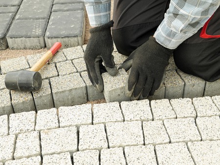 Paver laying pathway out of concrete pavement blocksの写真素材