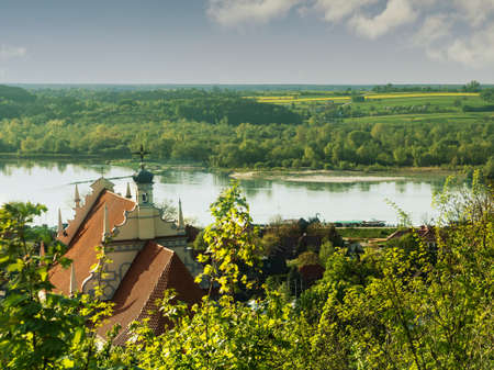 Panorama of Kazimierz Dolny town with Parish Church Fara, over the Vistula river Polandの写真素材