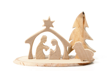 Christmas crib cut out from plywood over white の写真素材