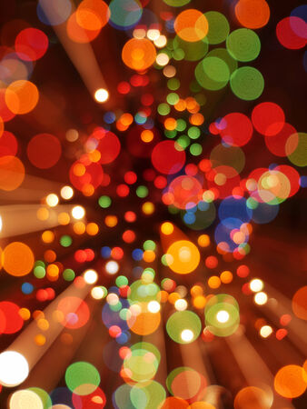 Background of blurred christmas tree lightsの写真素材