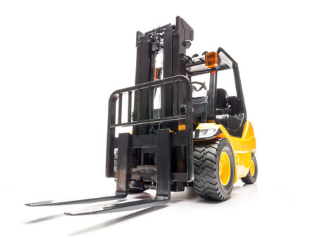Yellow forklift truck shot on white background