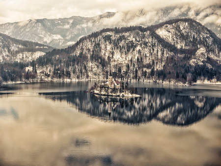 Lake Bled with the Pilgrimage Church of the Asumption of Maria on Bled island, Slovenia, Europeの写真素材