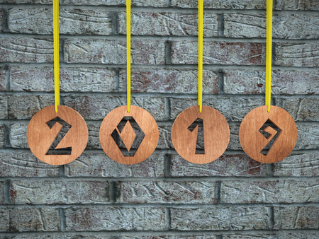 3D render of wooden ringlets with cut out 2019 date hanging against gray brick wallの写真素材