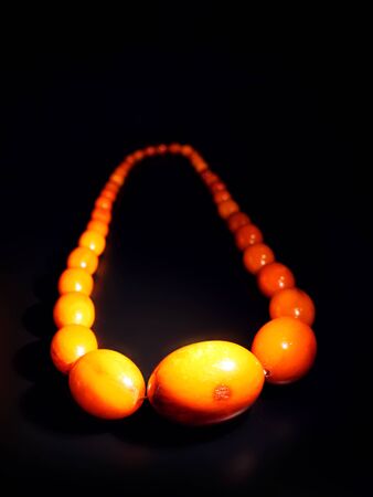 MALBORK, POLAND - 15 AUGUST, 2013: Amber necklace, exhibited in museum of Teutonic Malbork castle, Poland. Malbork castle is the largest brick fortress in the worldのeditorial素材