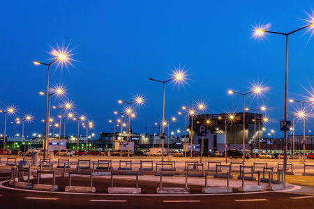 Lanterns at shopping mall parking lot illuminated at night