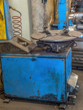 Tire changer station in small service garageの写真素材