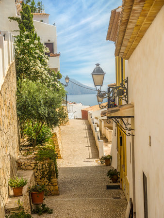 Quaint old narrow street in Altea town, Spainの写真素材