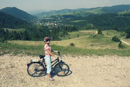 Woman on a bicycle in Pieniny National Parkの写真素材