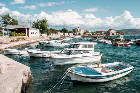 Boats moored in harborの写真素材