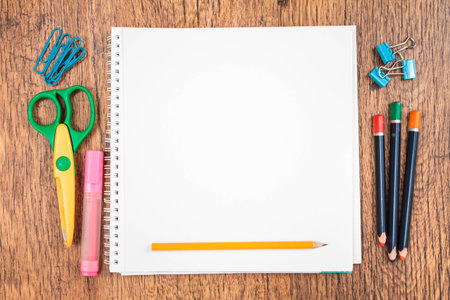 Top view of school accessories on a desk with copy spaceの写真素材