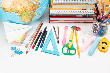 Top view of school accessories on a desk with copy spaceの写真素材
