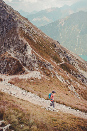 Boy hiking in the mountains