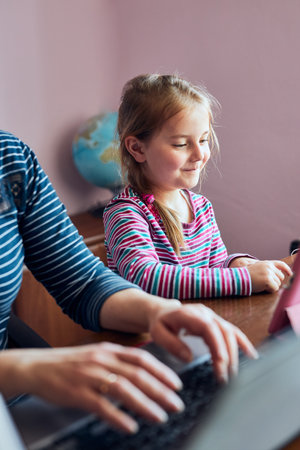 Woman mother working doing her job remotely during video chat call stream online course webinar on...