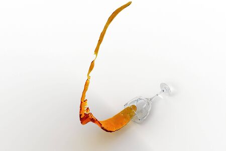 The glass falls and breaks into some splinters. Thus from it the drink spreads.の写真素材