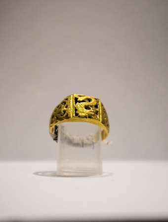 gold ring with dragon patternの写真素材