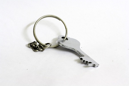 Simple key on keyring, isolated on whiteの写真素材