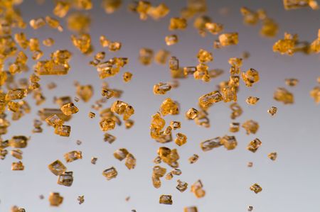 falling gold crystalsの写真素材