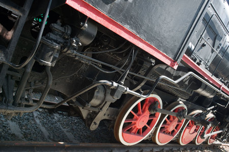 red wheels of steam locomotive