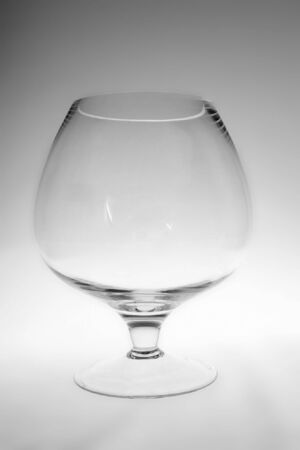 wide glass on gray gradient backgroundの写真素材