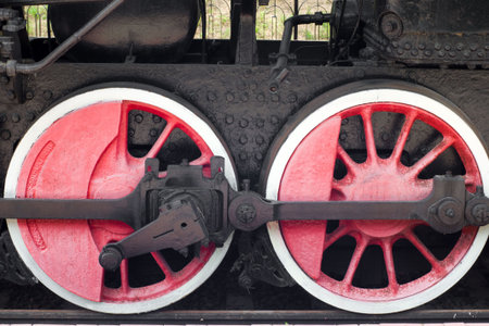 red wheels of steam locomotive