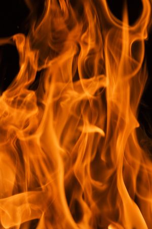 forks of flame on black backgroundの写真素材