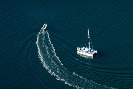 Two boats in the blue sea