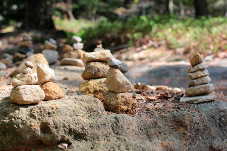 Pyramids and people of stones in the reserve Hrensko, Czech Republic. Trolls and chedo. Czech Switzerland. Bohemia. Pravcicka gate. Pravcicka branaの写真素材