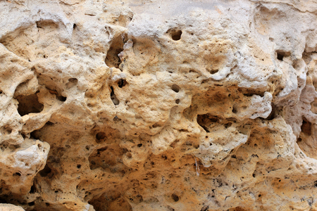 Geological layers of earth - Layered rock background. rock layer sediment. Layer of yellow sand. Crust of the Earth. Strata, slate or shale rock layers.の写真素材