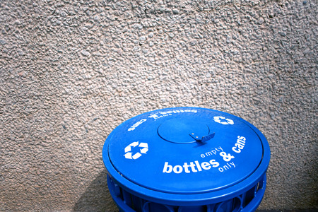 blue recycle trash bin for bottles and cans onlyの写真素材