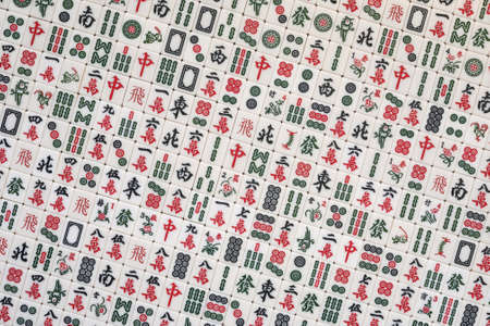 Stacked mahjong tiles as backgroundの写真素材