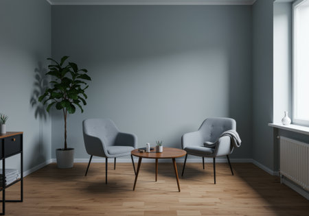 Interior of modern living room with gray walls, wooden floor, white armchairs standing near round coffee table and green plant. 3d renderingの素材