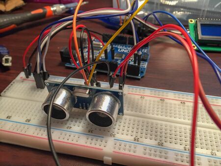 Microcontrollers and chips, resistors and LEDs on brown desktop of electronics engineer. Engineer workplaceの写真素材