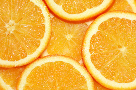A slices of fresh orange background 