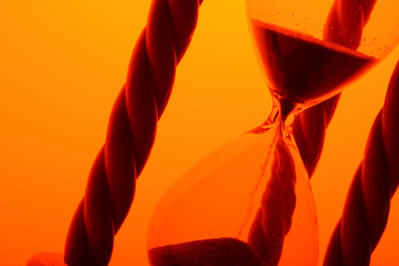 hourglass in gold light