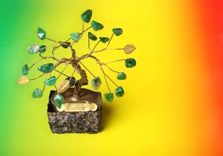 Tree of happiness on color backgroundの写真素材