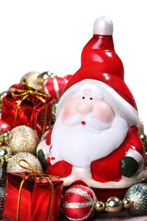 Funny Santa Claus with Christmas decorations isolated on white backgroundの写真素材