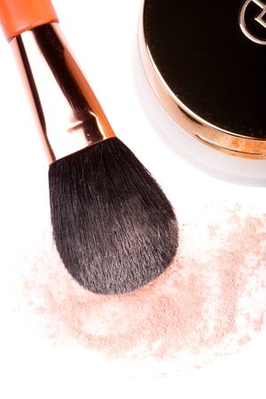 Make-up powder and brush isolated on white backgroundの写真素材
