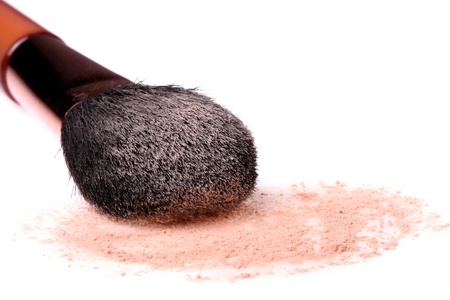 Make-up powder and brush isolated on white backgroundの写真素材