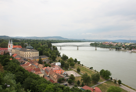 View of the Hungarian historic town Esztergom, the Danube river and the border bridge to the town of Sturovo in Slovakiaの写真素材