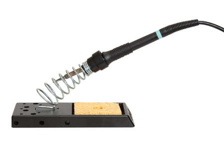 Electric soldering iron for soldering station on a stand with a cleaning spongeの写真素材